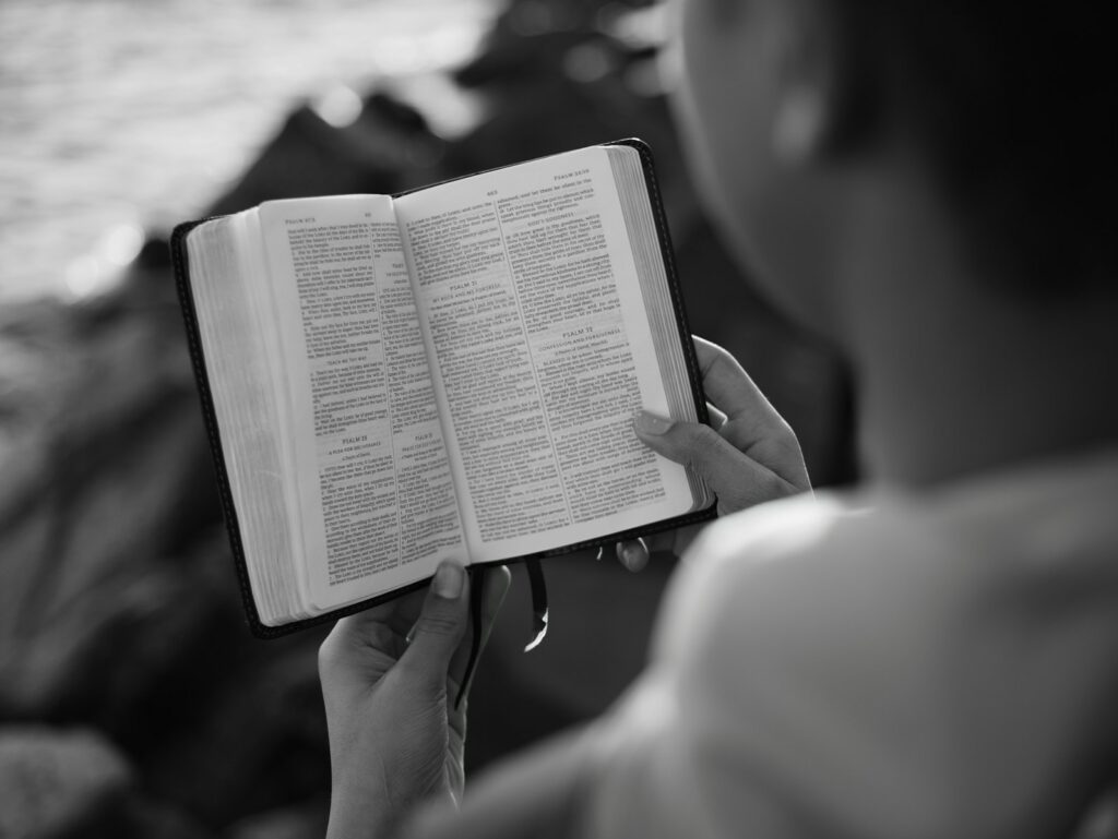 Reading the bible.